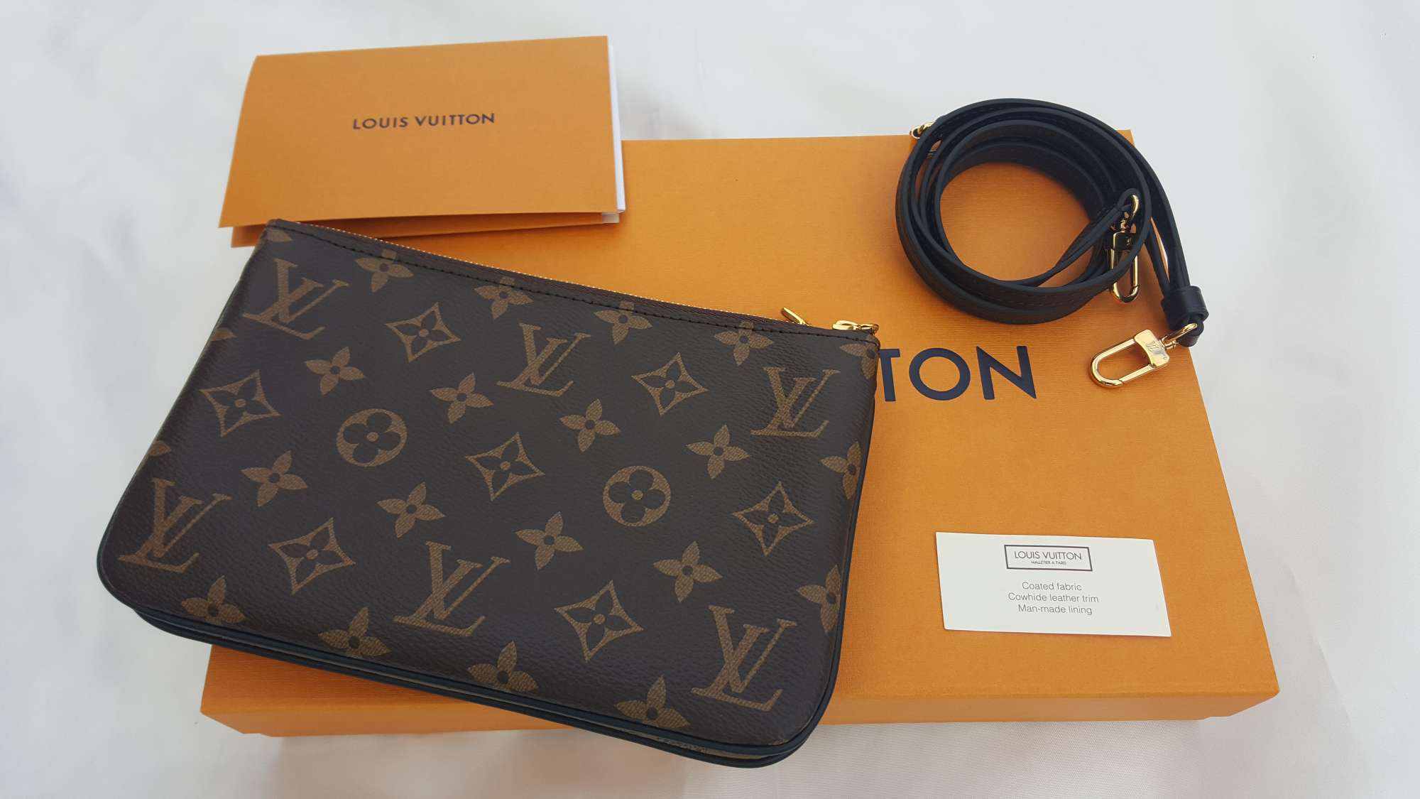 Shop Louis Vuitton DOUBLE V 2022-23FW Double Zip Pochette (M69203