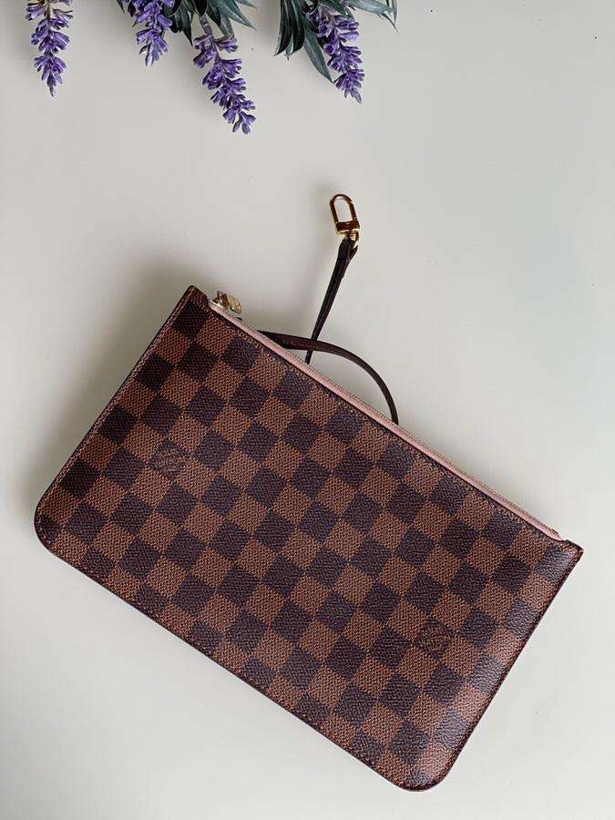 Louis Vuitton clutch z Neverfull