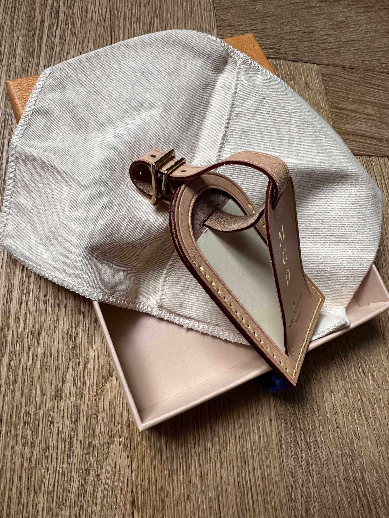 Louis Vuitton name tag