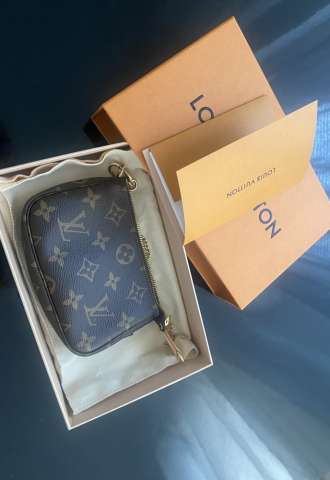 https://www.vipluxury.sk/Mini pochette monogram