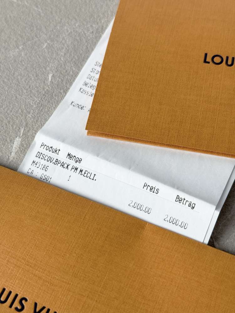 LOUIS VUITTON Discovery Monogram pánsky ruksak