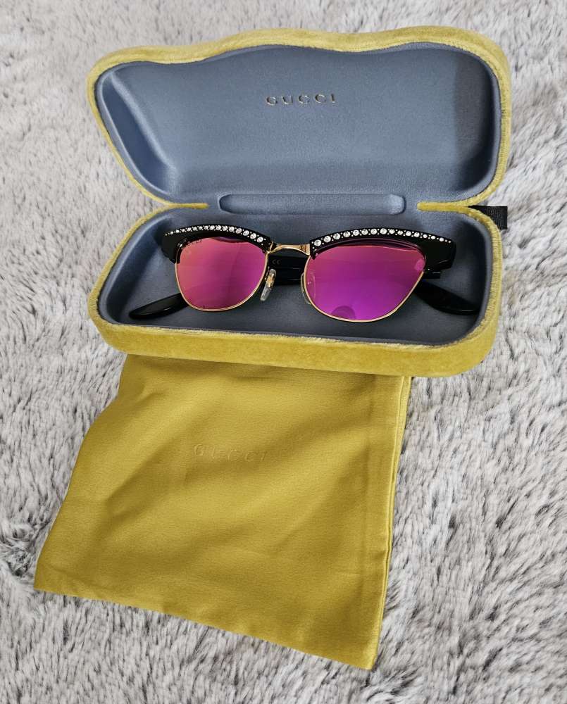 GUCCI slnečné okuliare.
