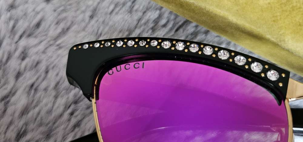GUCCI slnečné okuliare.