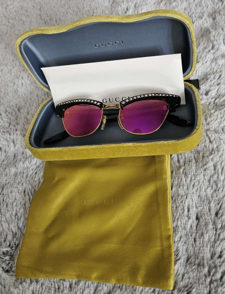 GUCCI slnečné okuliare.
