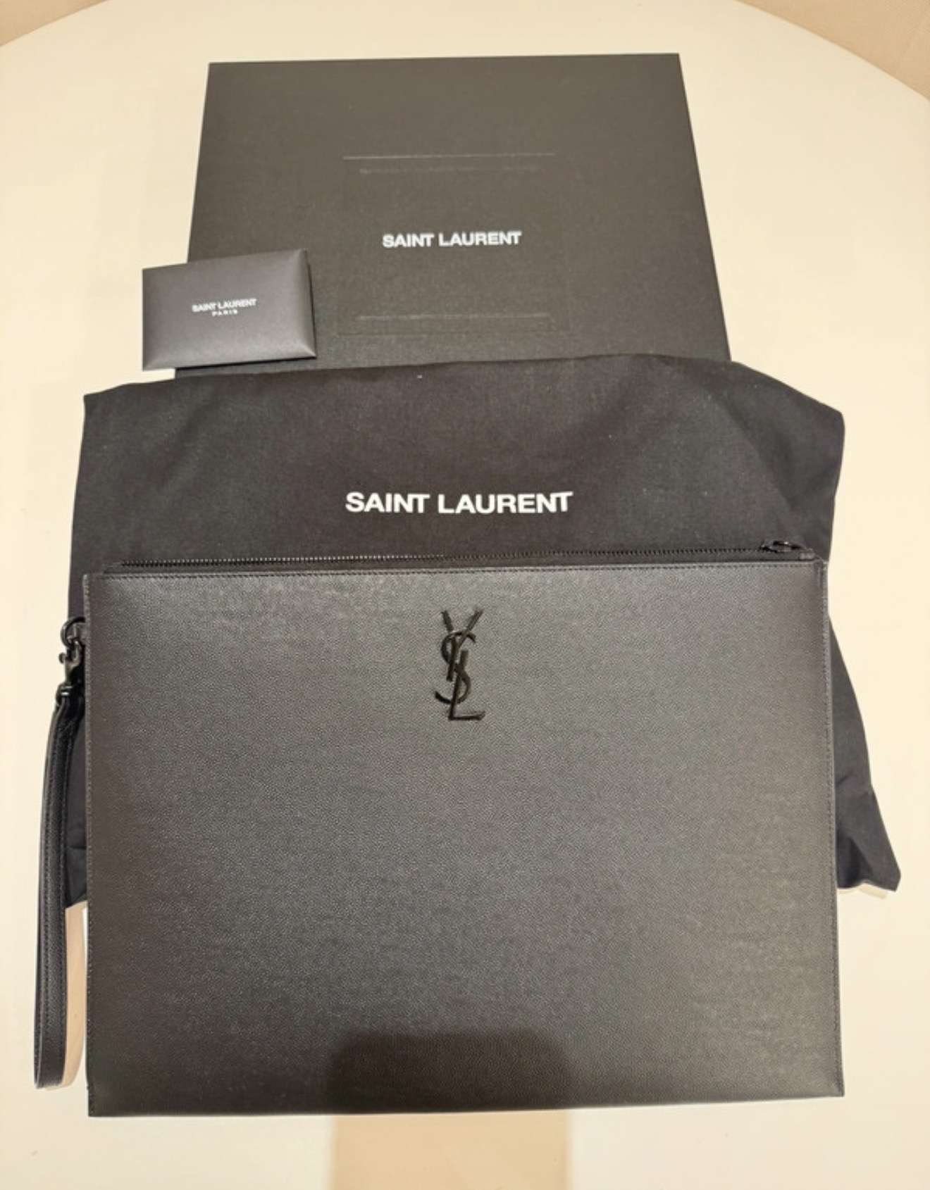 YSL pánsky clutch