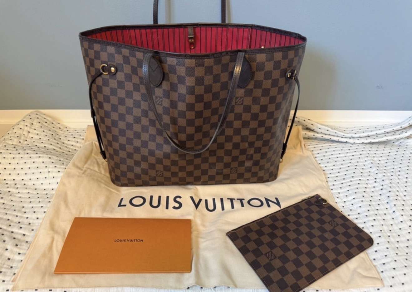 Louis Vuitton Neverfull GM s clutchom