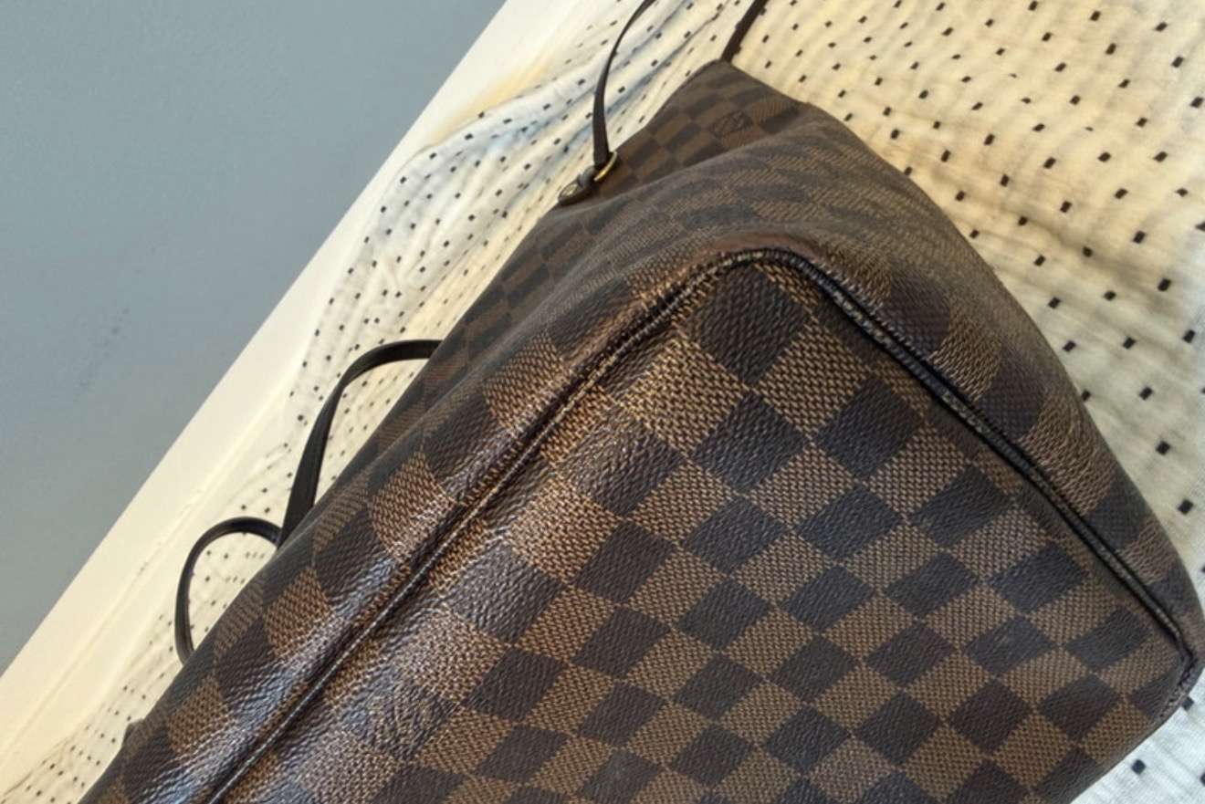 Louis Vuitton Neverfull GM s clutchom