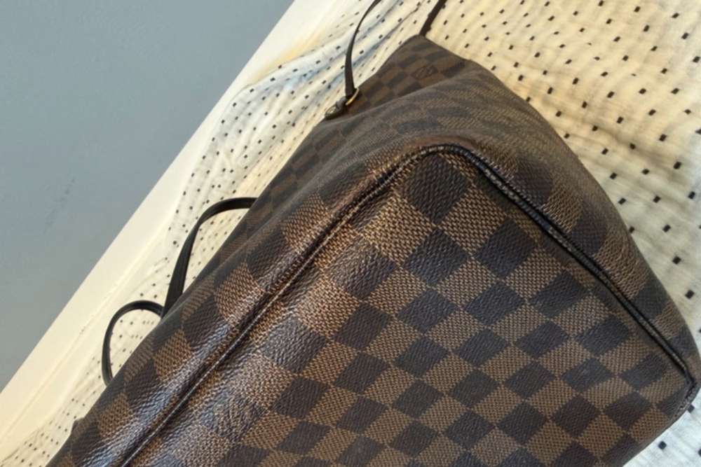 Louis Vuitton Neverfull GM s clutchom