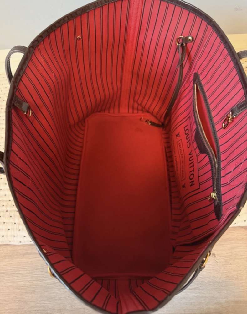 Louis Vuitton Neverfull GM s clutchom