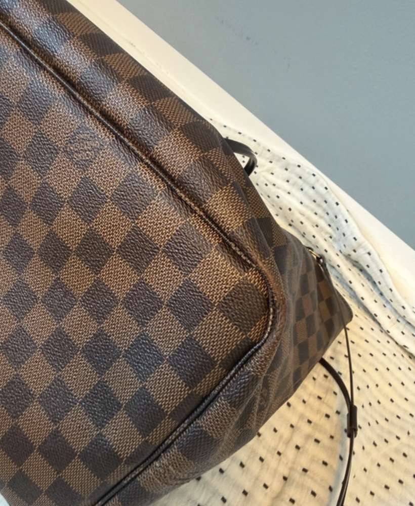 Louis Vuitton Neverfull GM s clutchom