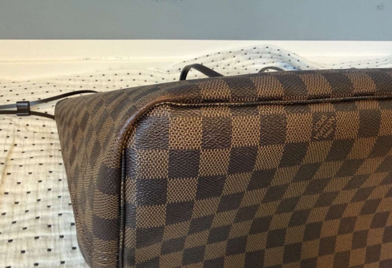 Louis Vuitton Neverfull GM s clutchom