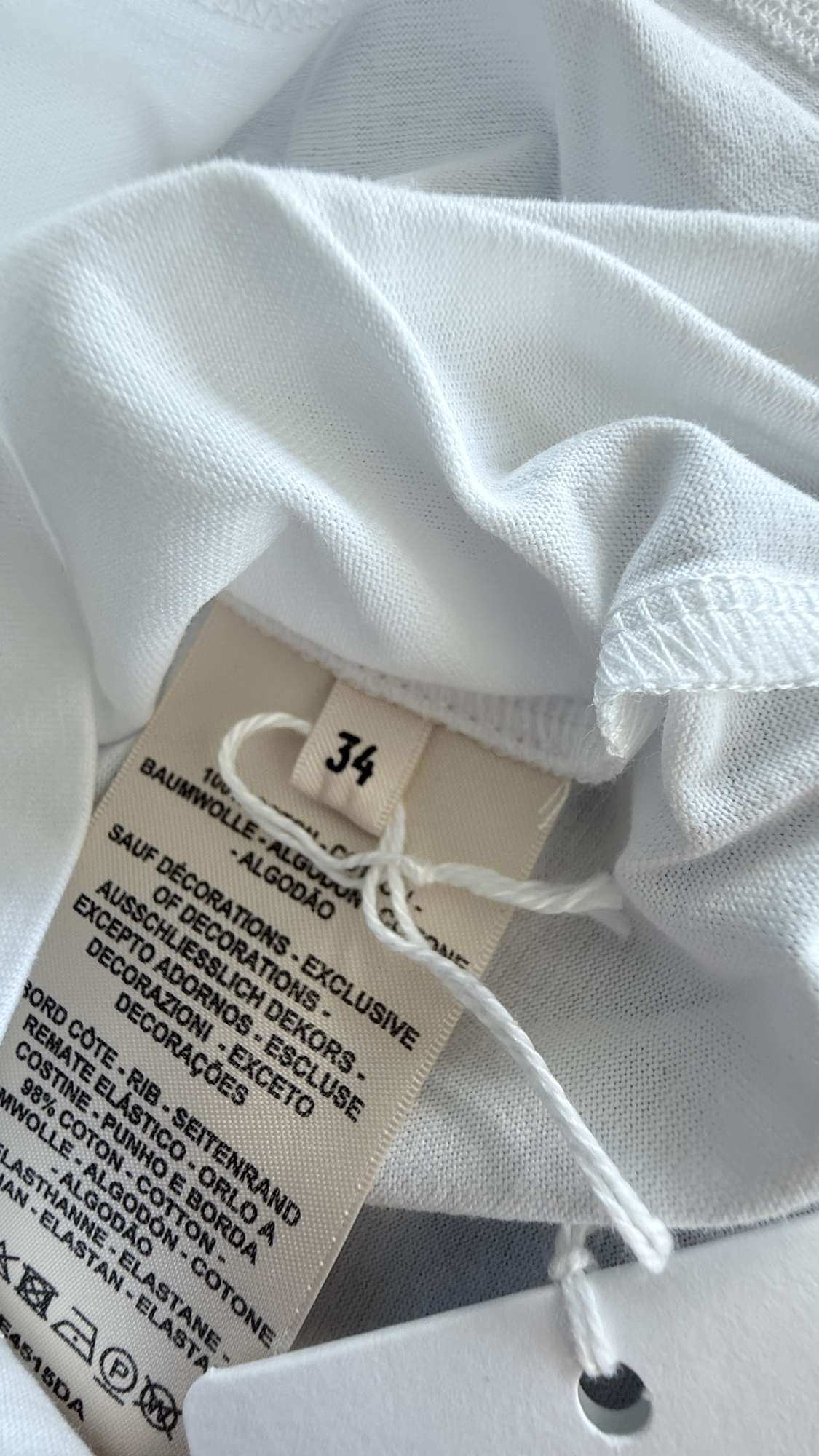 Vyšívané šaty Hermès s vreckom v tvare „H“