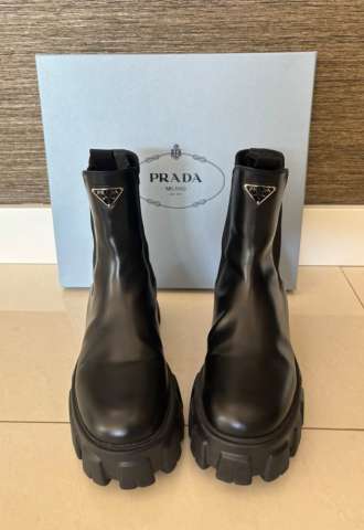 https://www.vipluxury.sk/Členkové monolitové čižmy Prada 40
