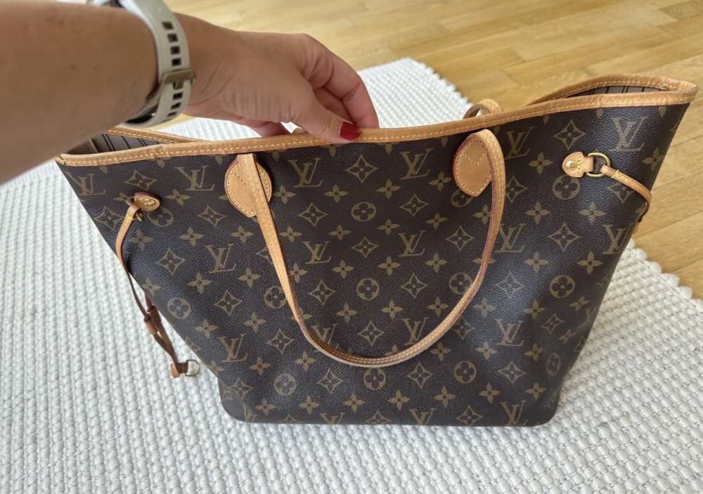 Louis Vuitton Neverfull MM s clutchom